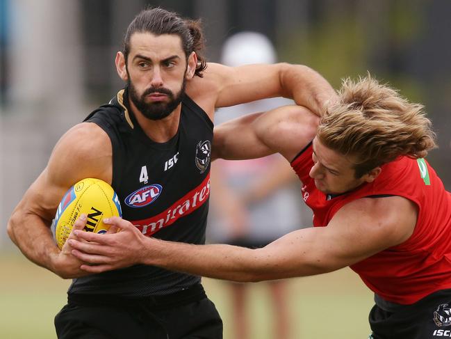 MELBOURNE, AUSTRALIA - MARCH 15: Brodie Grundy of the Magpies (L) competes for the ball against Max Lynch of Collingwood during the Collingwood Magpies Training Session on March 15, 2019 in Melbourne, Australia. (Photo by Michael Dodge/Getty Images)