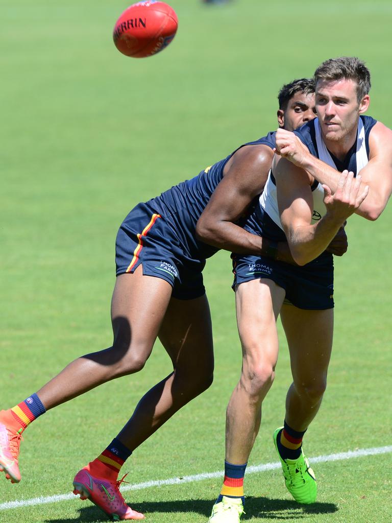 Tariek Newchurch tackles Paul Seedsman. Picture: Michael Marschall.