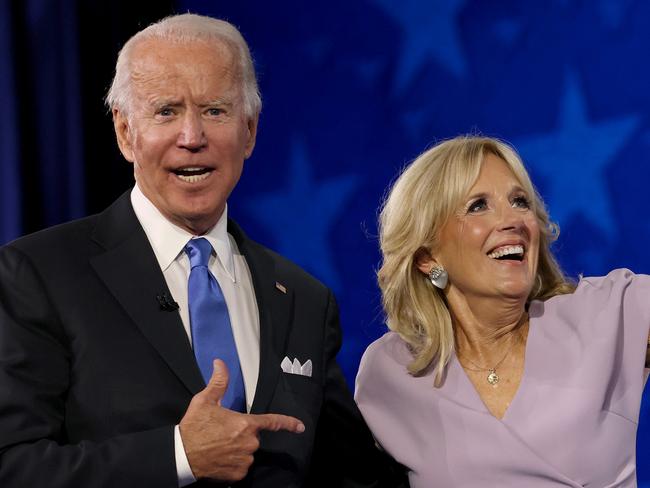 FILE:  WILMINGTON, DELAWARE - AUGUST 20: : Democratic presidential nominee Joe Biden embraces his wife Dr. Jill Biden after delivering his acceptance speech on the fourth night of the Democratic National Convention from the Chase Center on August 20, 2020 in Wilmington, Delaware. The convention, which was once expected to draw 50,000 people to Milwaukee, Wisconsin, is now taking place virtually due to the coronavirus pandemic.   Win McNamee/Getty Images/AFP