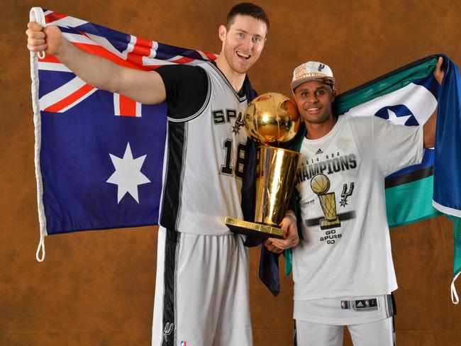 Aron Baynes and Patty Mills after winning the 2014 NBA championship with the San Antonio Spurs. Picture: Jesse D. Garrabrant/NBAE via Getty Images