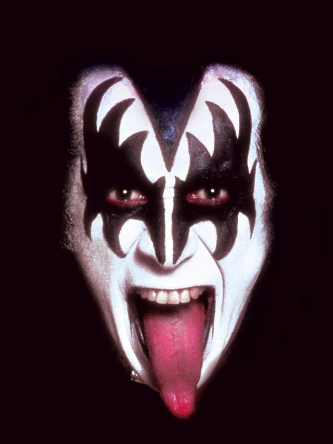 A Canberra schoolteacher said her students might have innocently been impersonating KISS singer Gene Simmons when they were making a “pussy mouth” gesture.