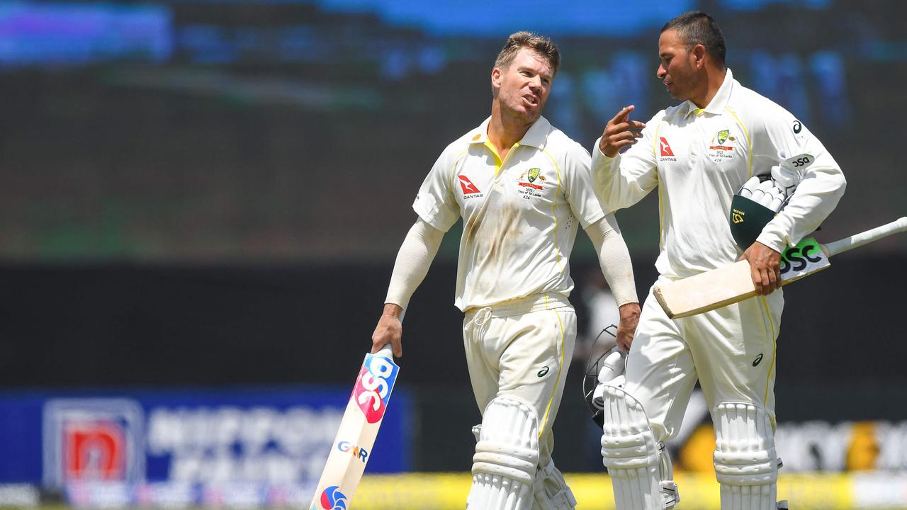 Warner and Khawaja go way back. Picture: AFP