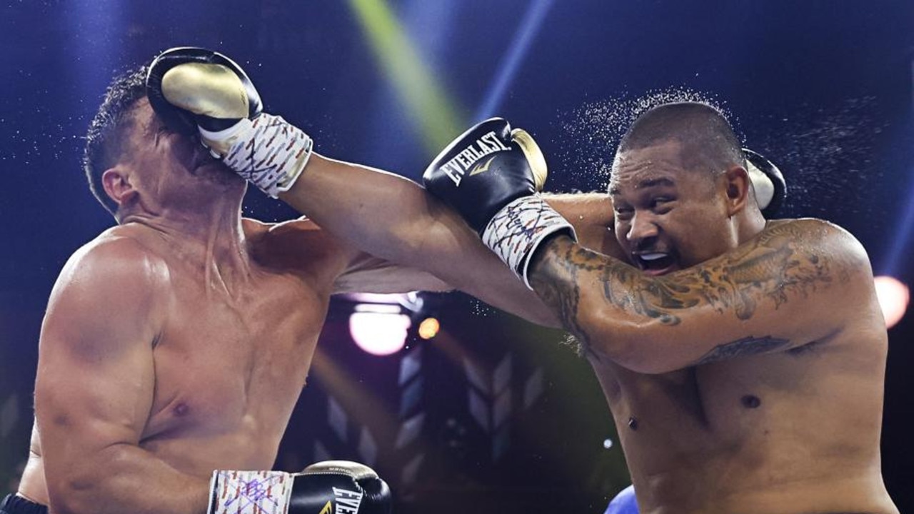 Joey Leilua (R) and Chris Heighington fight during their Footy Fight Night Christmas Bash heavyweight bout at The Star on December 22, 2021. (Photo by Mark Evans/Getty Images)