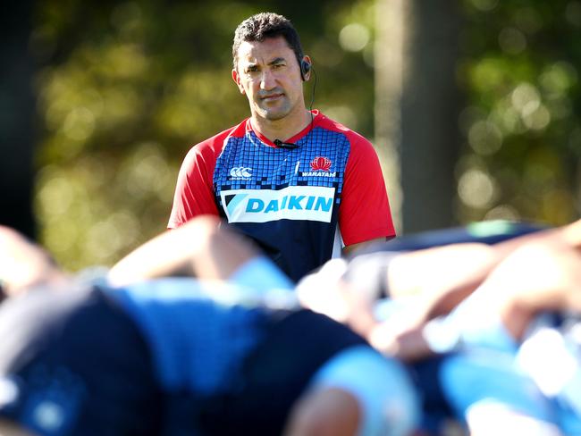 Daryl Gibson watches his forwards scrummage during the Waratahs training session at  Bus Loop Oval, Moore Park . Picture : Gregg Porteous
