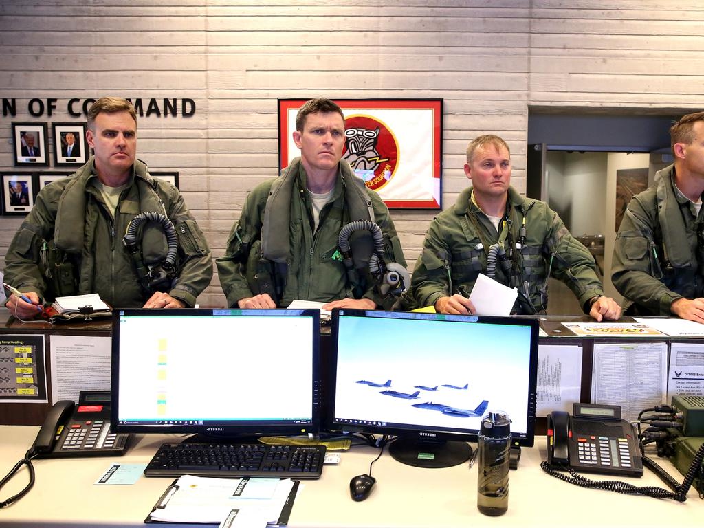 Australian Pilots training in the F35 fighter Jets Luke Airforce Base in Phoenix Arizona. (LtR) Squadron Leader Wing Commander Darren Clare, Squadron Leader “Jacko”, Lieutenant colonel Rhett “Hero” Hierlmeier (US Air Force) and Flight Lieutenant “Damo” prepare for a flight. Picture: Nathan Edwards