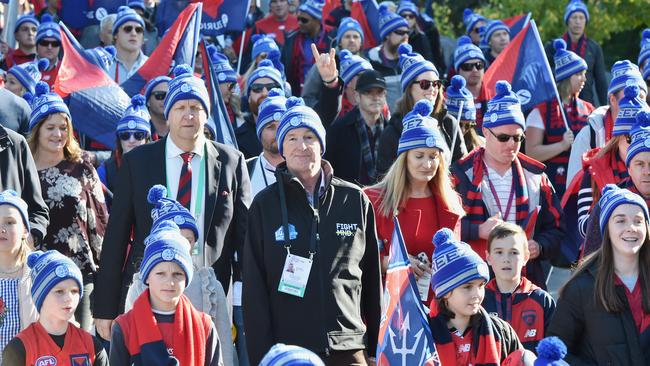Neale Daniher walks to the MCG for the Big Freeze this year, surrounded by a sea of supporters. Picture: Jason Edwards