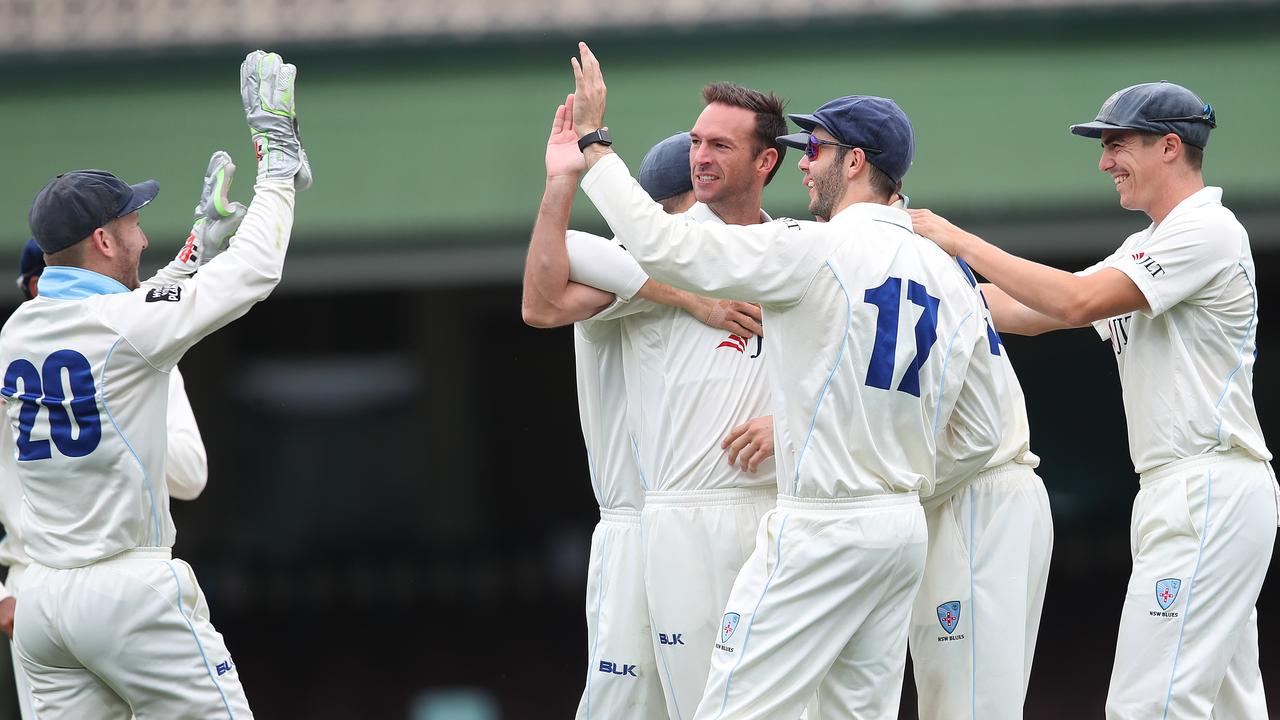 Trent Copeland celebrates the dismissal of George Bailey during Day 3 of the Sheffield Shield match between NSW and Tasmania at the SCG. Picture: Phil Hillyard