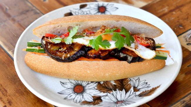 Long roll with marinated eggplant at the Golden Times cafe. Picture: John Gass