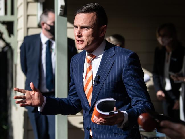 SYDNEY, AUSTRALIA - August 22: Auctioneer Damien Cooley holding the auction of 7 Third Avenue, Epping. The house was auctioned with no reserve and sold for $1,871,000. (Photo by James Gourley/The Sunday Telegraph)