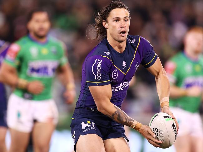 CANBERRA, AUSTRALIA - MAY 22: Nicho Hynes of the Storm passes during the round 11 NRL match between the Canberra Raiders and the Melbourne Storm at GIO Stadium, on May 22, 2021, in Canberra, Australia. (Photo by Mark Kolbe/Getty Images)