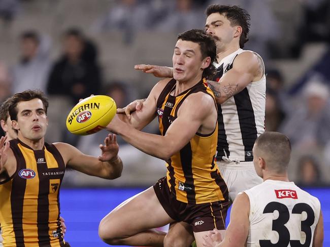 Connor Macdonald of the Hawks attempts to mark the ball during the round 19 AFL match. Picture: Darrian Traynor/Getty Images.