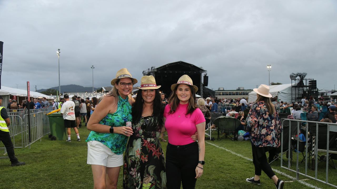 Tash Pearson, Nicola McDonough and Isabella Pearson enjoy the Cairns edition of the Red Hot Summer Tour, held at the Cairns Showgrounds on May 25 2024. Picture: Angus McIntyre