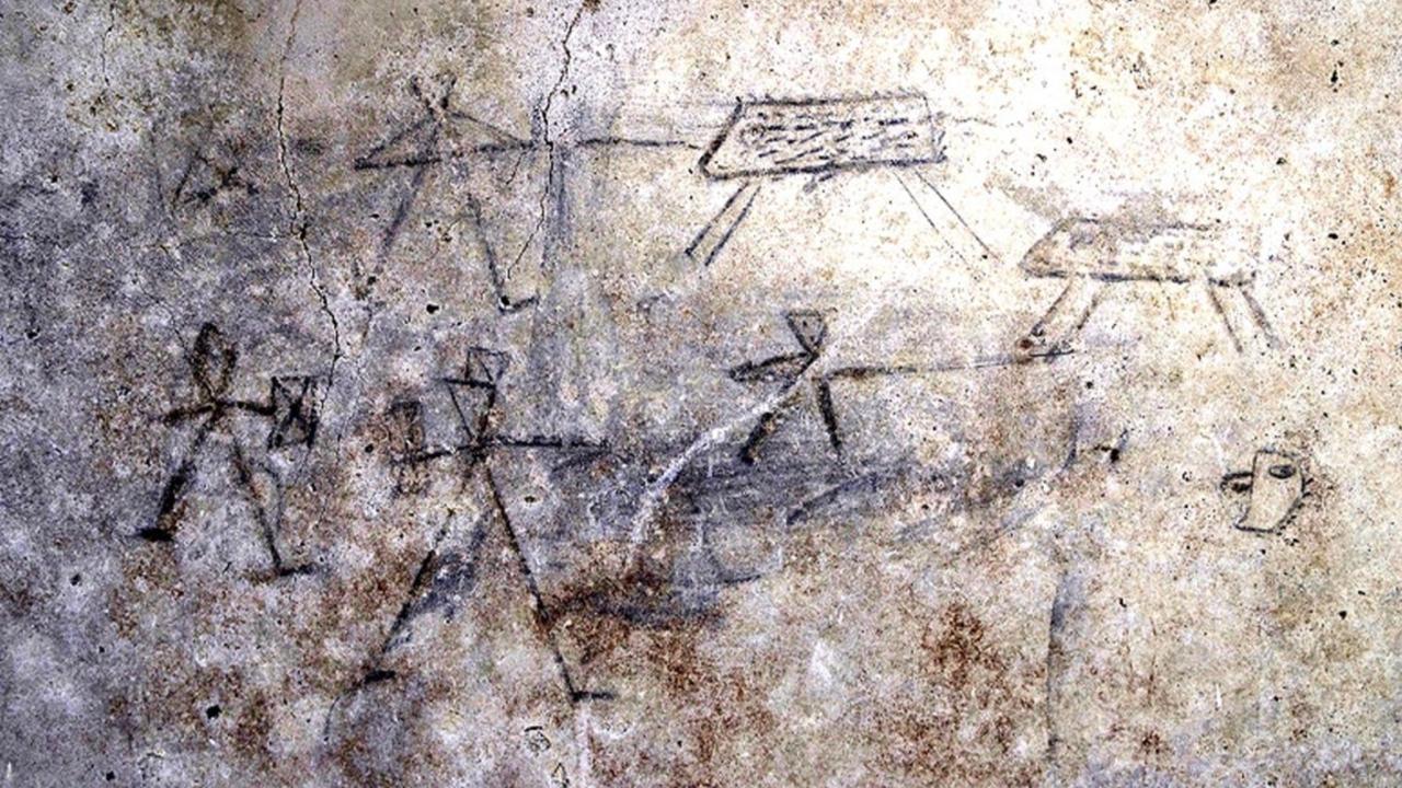 The discovery of Pompeii stick drawings show young children watched gladiator fights, say archaeologists.