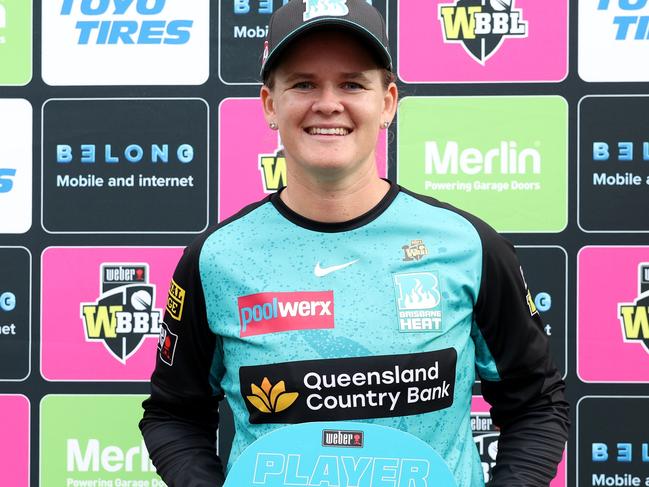 SYDNEY, AUSTRALIA - NOVEMBER 14:  Jess Jonassen of the Heat poses with the player of the match award during the WBBL match between Sydney Sixers and Brisbane Heat at North Sydney Oval on November 14, 2024, in Sydney, Australia. (Photo by Matt King/Getty Images)