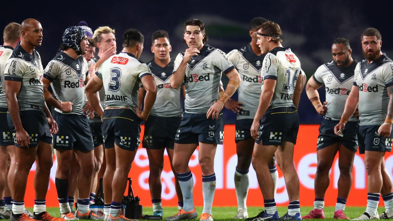 SYDNEY, AUSTRALIA - JULY 23: Storm players look on after conceding a try during the round 19 NRL match between the South Sydney Rabbitohs and the Melbourne Storm at Stadium Australia on July 23, 2022 in Sydney, Australia. (Photo by Jason McCawley/Getty Images)