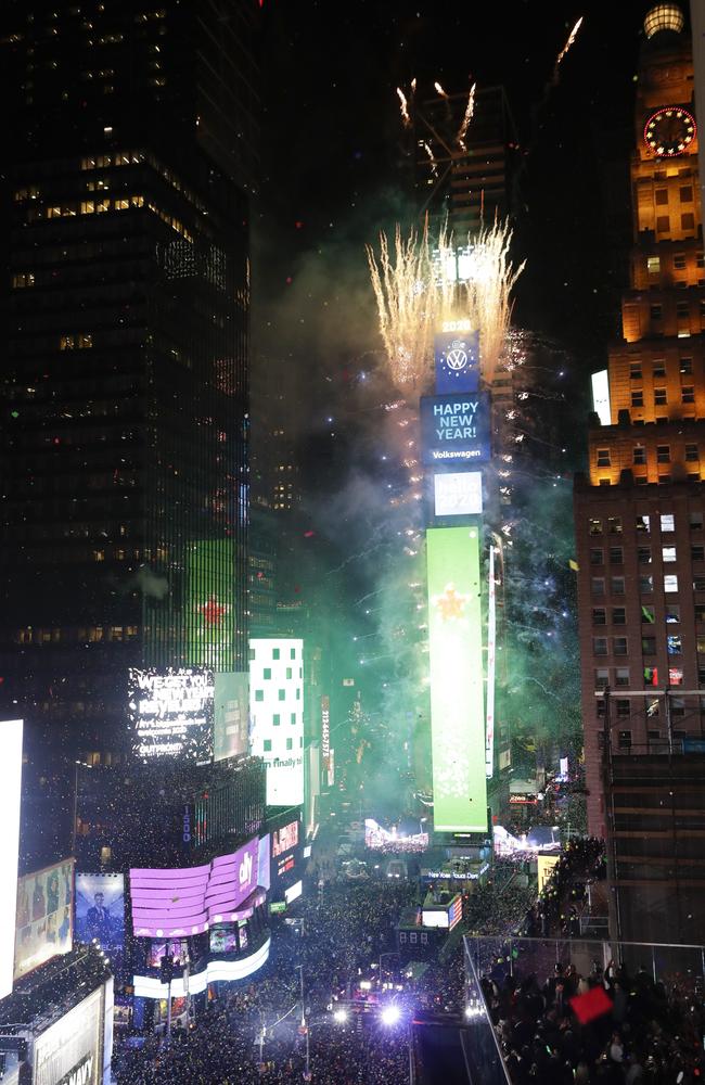 Confetti drops over the crowd during the New Year's celebration in Times Square. Picture: AP