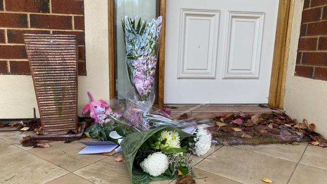 Flowers left outside the Kensington Park home where Ann Marie Smith lived. Picture: Gabriel Polychronis