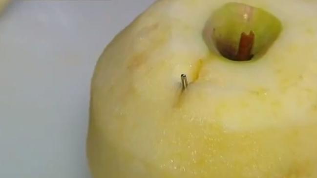 The pin inserted in the pink lady apple. Picture: Seven Network