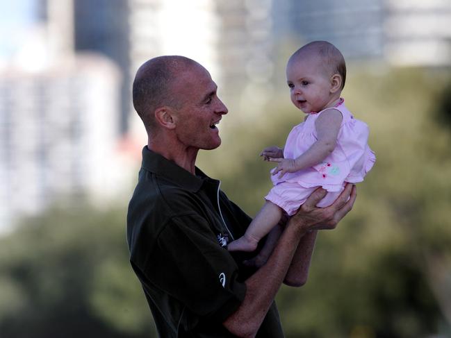 Holiday Inn, Surfers, for the press conference of the Gold Coast Airport Marathon . Marathon favourite Lee Troop with baby daughter Macy Troop 5mths.