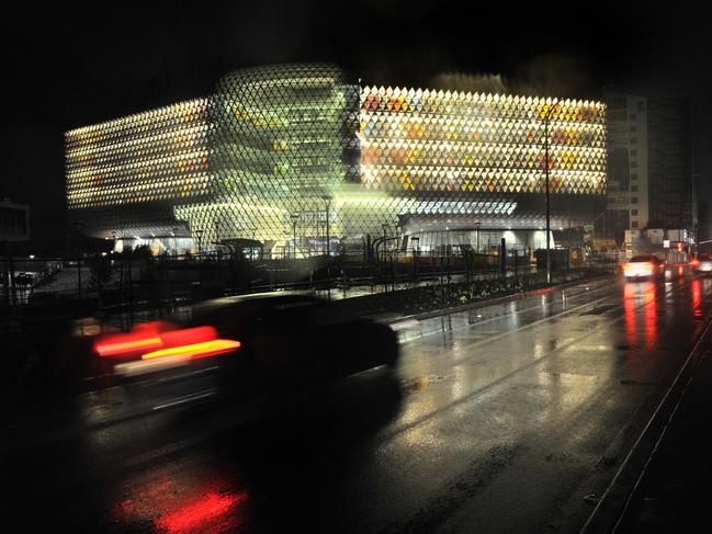 Traffic heads past the SAMHRI building, which got power back up and working sooner than many other buildings, after the statewide blackout. Picture: AAP / David Mariuz