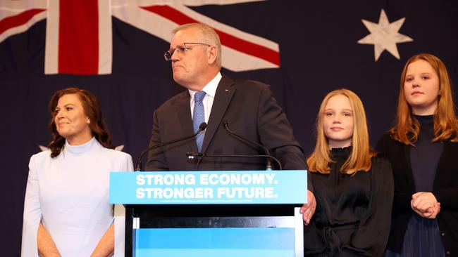 Scott Morrison, flanked by his wife Jenny Morrison and daughters Lily Morrison and Abbey Morrison, says he will step down as leasd of the Liberal Party. Picture: Asanka Ratnayake/Getty Images