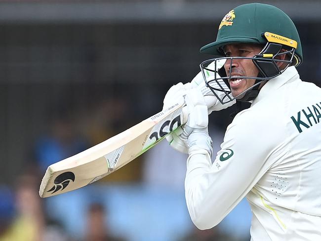 Australia's Usman Khawaja plays a shot during the first day of the third Test cricket match between India and Australia at the Holkar Stadium in Indore on March 1, 2023. (Photo by Sajjad HUSSAIN / AFP) / ----IMAGE RESTRICTED TO EDITORIAL USE - STRICTLY NO COMMERCIAL USE-----