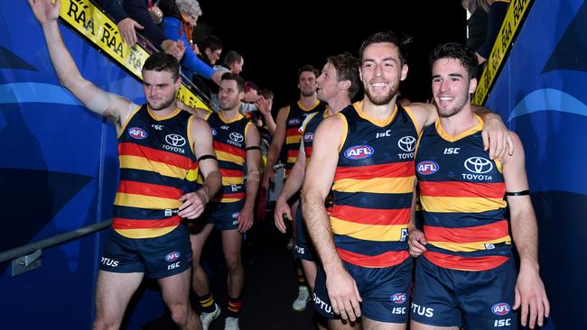 Crows players with their armbands celebrate their win over St Kilda. Picture: Mark Brake/Getty Images