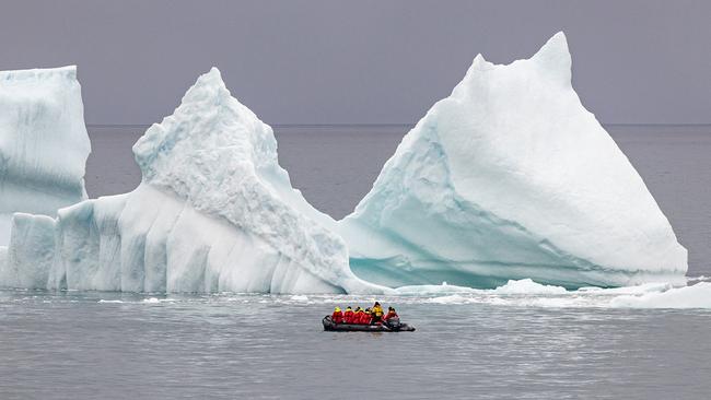 Zodiac excursions can land you on Arctic beaches, or cruise through the sea ice or past moraines before returning to the ship. Picture: Ted Gatlin (Supplied).