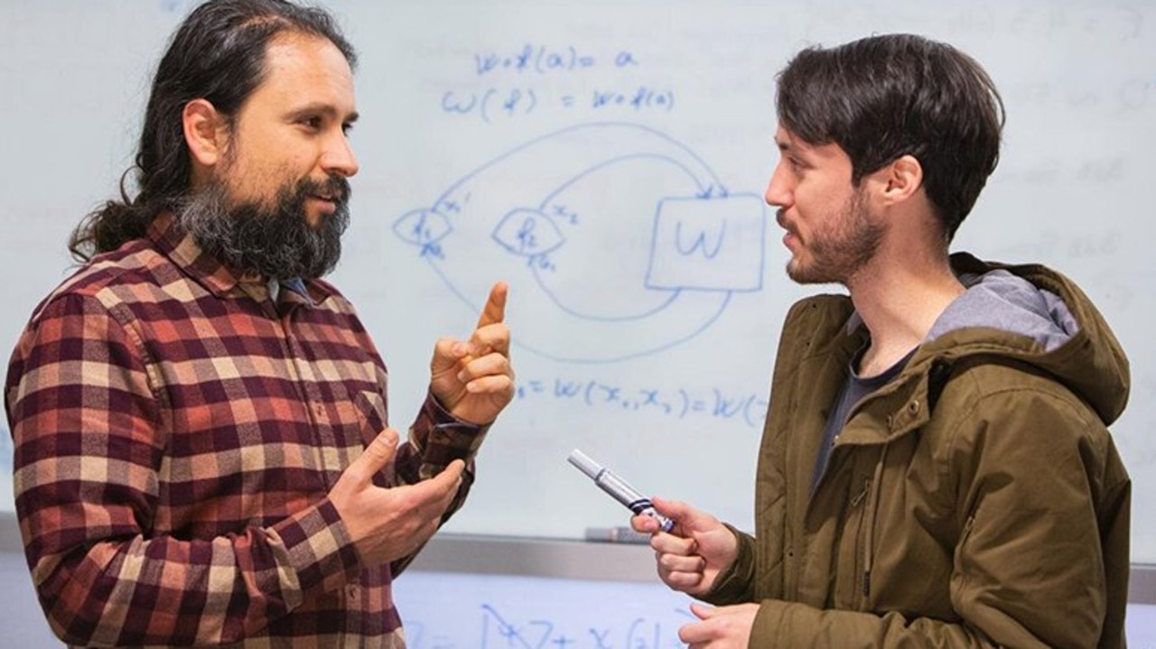 Dr Fabio Costa, left, with Bachelor of Advanced Science student Germain Tobar. Picture: UQ