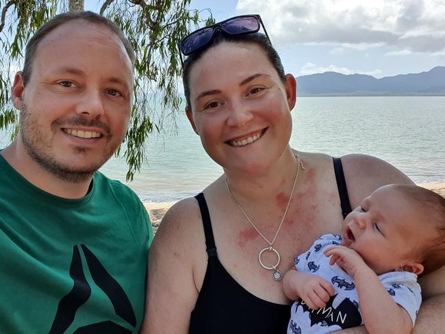 Ashlee and Adam Holstein with their new-born son, Mars.