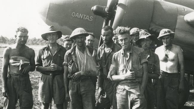 WWII soldiers in front of Qantas plane. Picture: Qantas