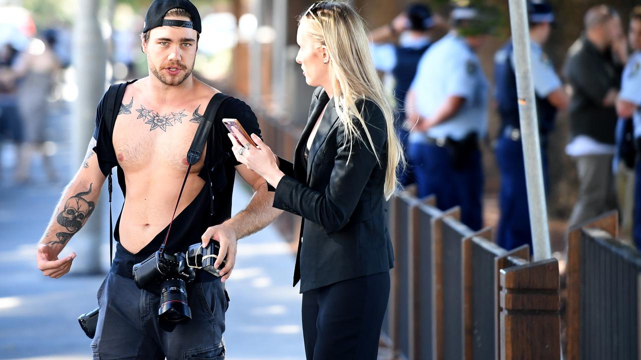 News Corp photographer Dylan Robinson and reporter Eliza Barr after the confrontation. Picture: AAP 