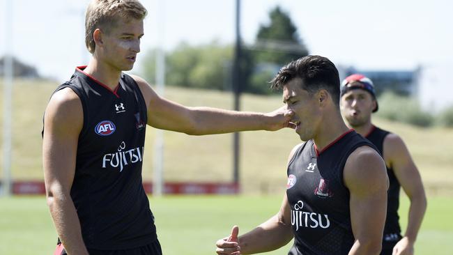 Dylan Shiel and Nick Bryan at Essendon training.