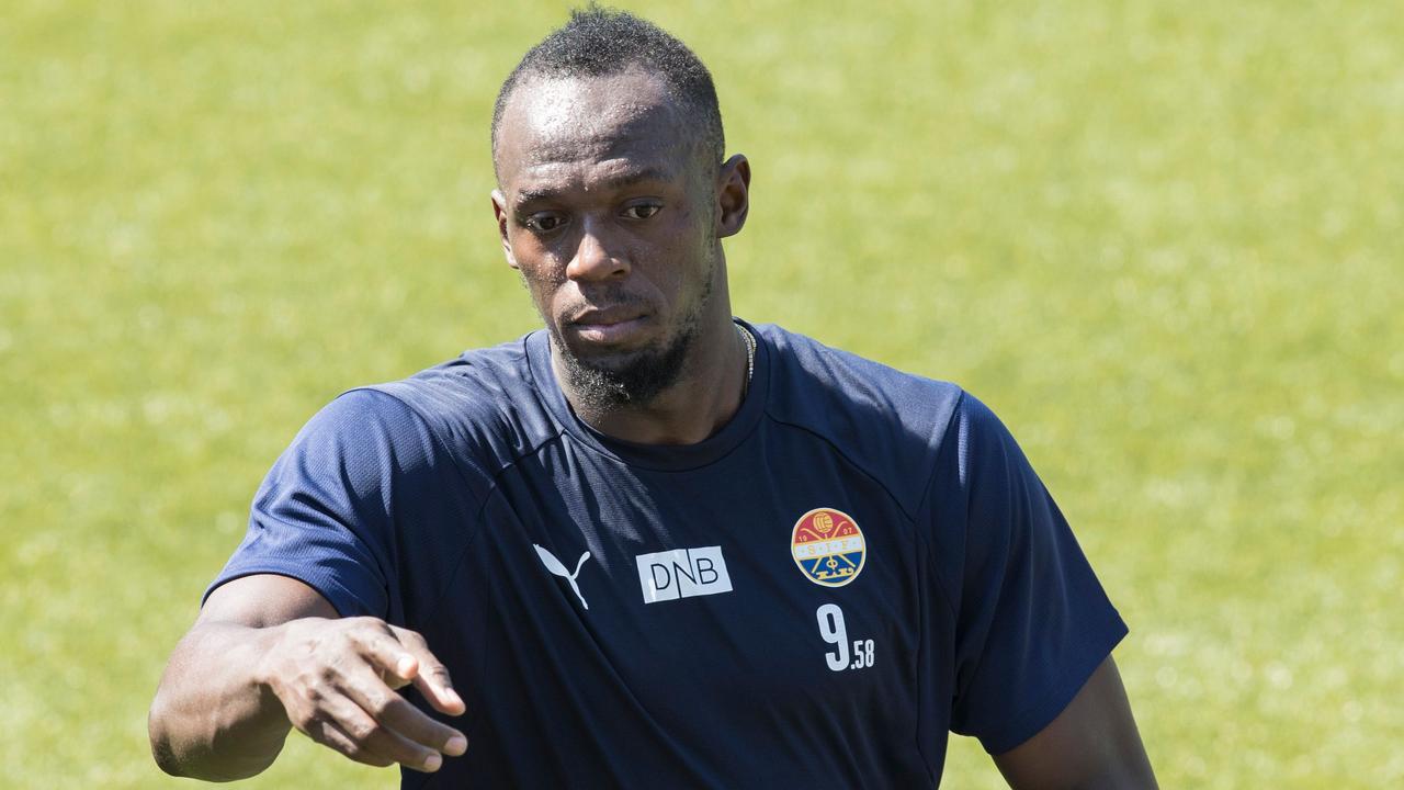 Usain Bolt takes part in a football training session with the Norwegian football club Stromsgodset.