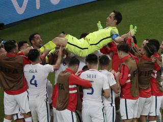 Chile goalkeeper Claudio Bravo is thrown in the air after winning the Confederations Cup, semifinal soccer match between Portugal and Chile, at the Kazan Arena, Russia, Wednesday, June 28, 2017. (AP Photo/Dmitri Lovetsky)
