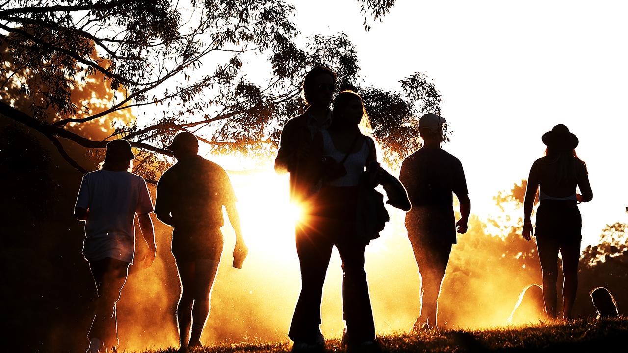 Festival goers walk away from the Amphitheatre stage as the sun sets during Splendour In The Grass 2019 on July 19, 2019 in Byron Bay, Australia. (Photo by Mark Metcalfe/Getty Images)