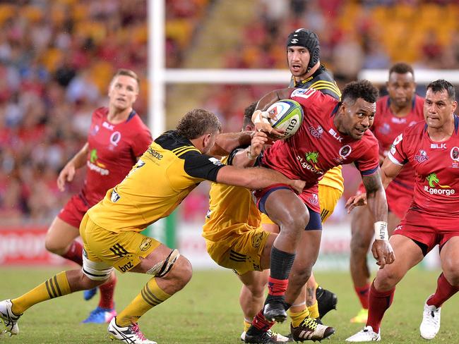 Reds centre Samu Kerevi tries to cut loose during the loss to the Hurricanes. Picture: Getty Images