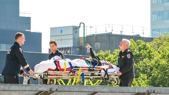 TV presenter Grant Denyer is air lifted to the Alfred Hospital after a car crash. Picture:Eugene Hyland