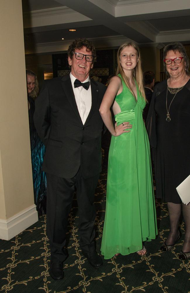 Roger &amp; Maggie Baike sandwich Indiana Cobb at the Intercontinental Sanctuary Cove hosts the Miss Australia National Final and crowning of three Miss Australia’s on the Gold Coast. Picture: Glenn Campbell