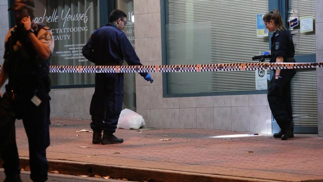 Forensics investigate a stabbing at St George Dance Studio Kogarah. Picture: Damian Hoffman