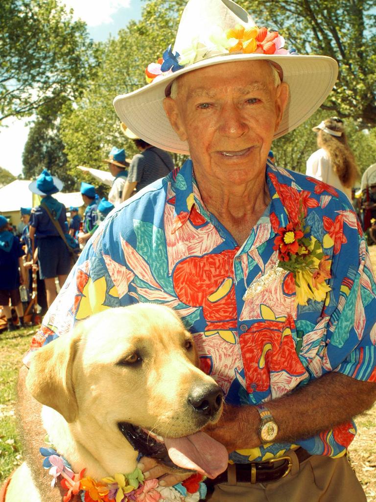 John Carney and his mate Goldie the labrador at the Carnival of Flowers Parade in Toowoomba. Picture: David Martinelli