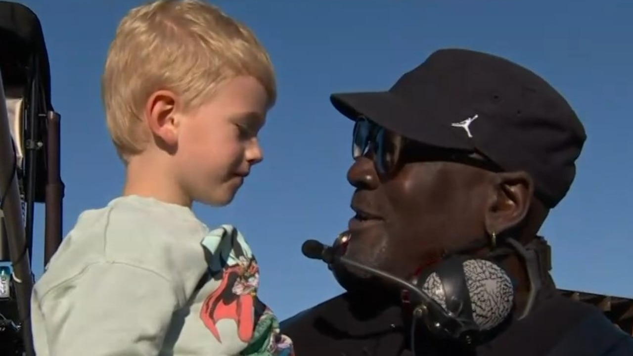 Michael Jordan celebrates with Tyler Reddick's son.