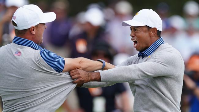 Tiger Woods celebrates after Justin Thomas’ decisive putt on day two of the Presidents Cup.