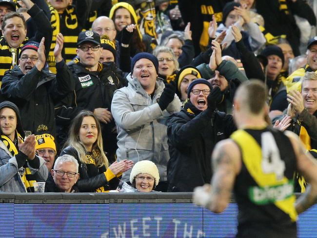 Giving Dusty a standing ovation in the final quarter is a new favourite hobby for Tiger fans at the G. Picture: Michael Dodge/Getty