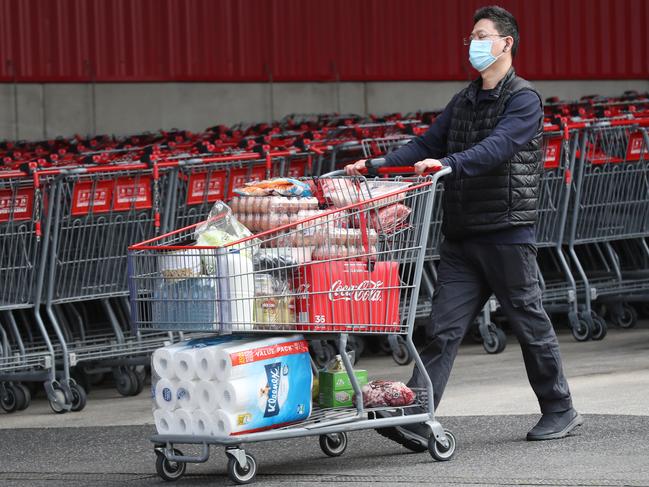 The rush for supplies at Costco in Docklands. Picture: David Crosling