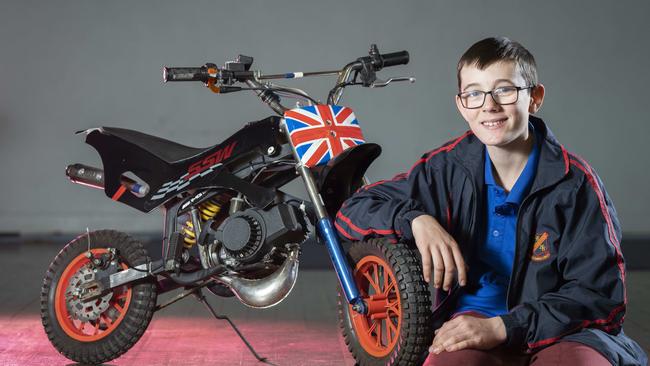 The school adopted a project-based learning approach in 2014. Pictured is student Judah Haynes with the mini bike he built. Picture: Matthew Vasilescu