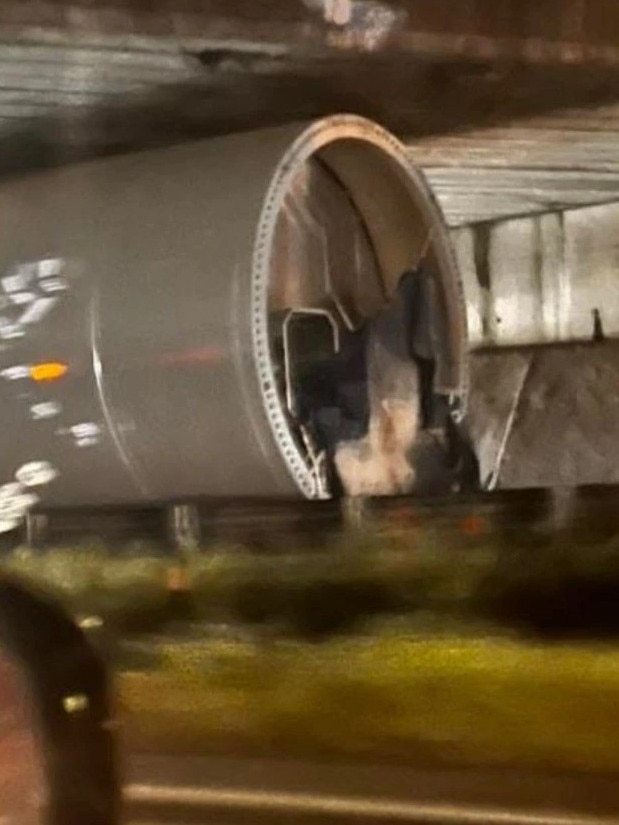 The turbine remains wedged beneath the Mount Crosby overpass. Picture: Facebook