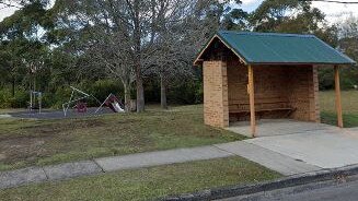 Two racist stickers were found at this bus stop, near the playground at Cook Reserve, Forestville. Picture: Google Maps