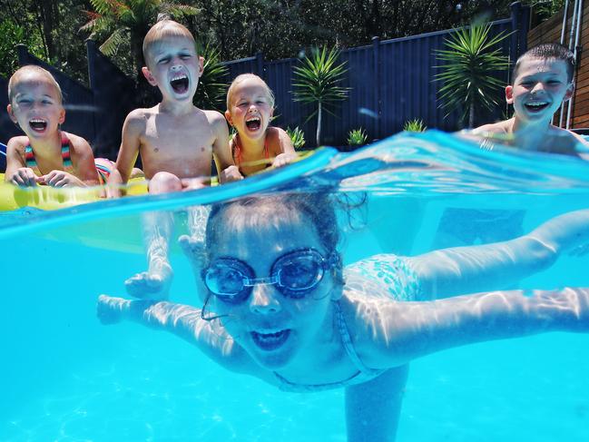 Harper Chiswick, Jake Lehepuu, Mahlia Chiswick, Florence Hanks and Archie Hanks enjoying a swim. Picture: Sam Ruttyn