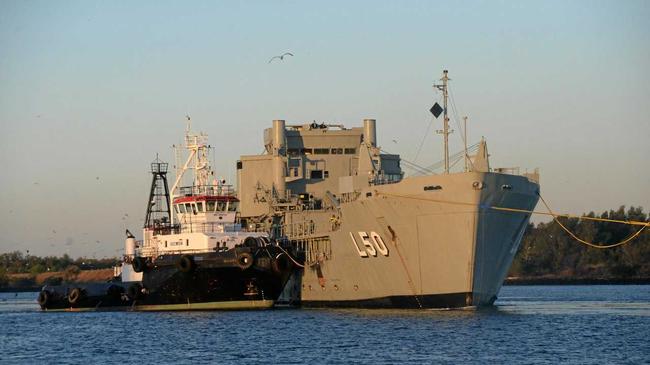 FINAL GOODBYES: ex-HMAS Tobruk leaves Bundaberg Port on her way to her final resting place off the coast of Wide Bay. Picture: Ben Turnbull